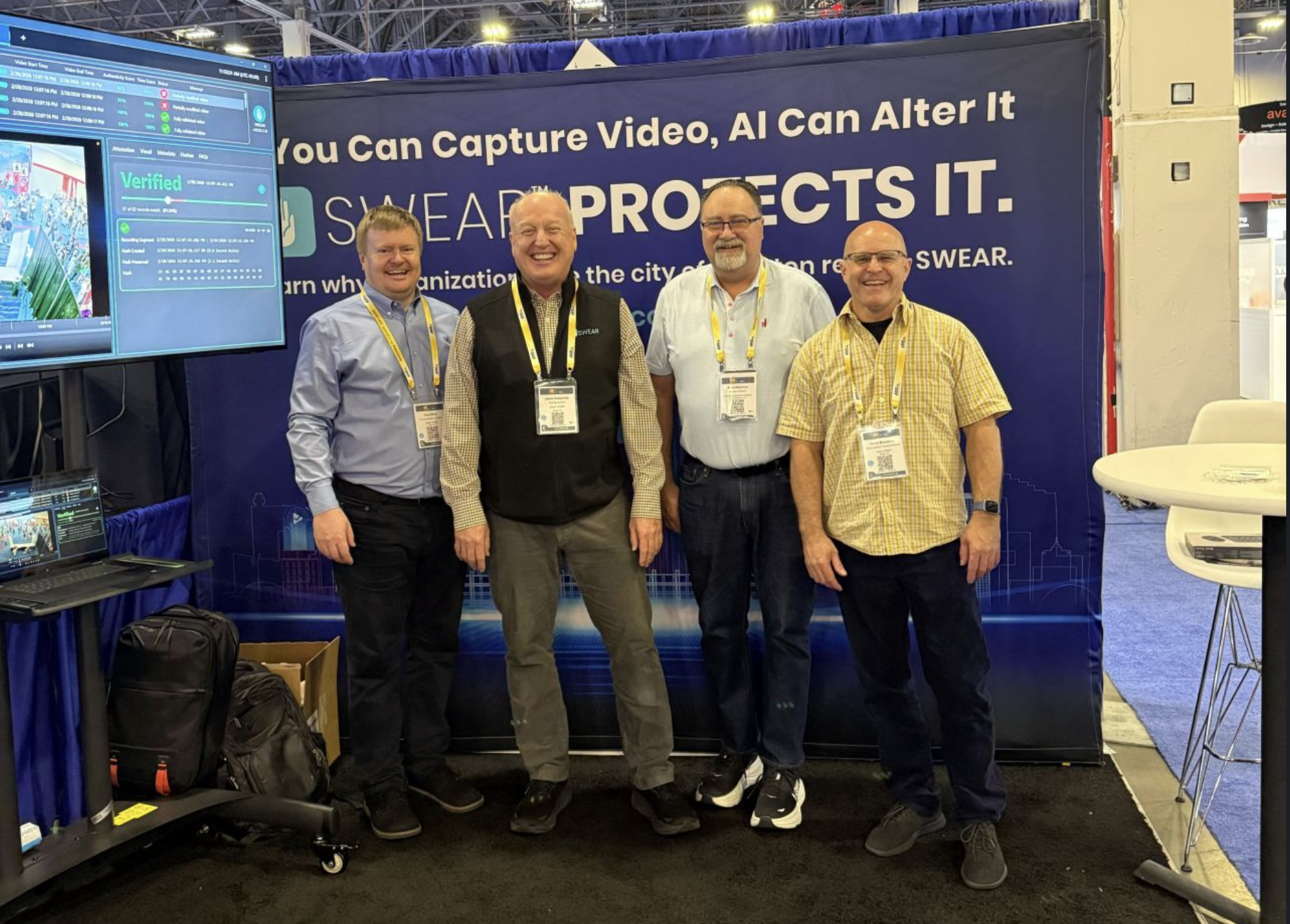 4 coworkers of swear company in an event